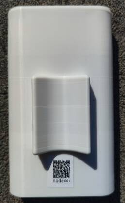 The enclosure, back, with the QR code The enclosure, back, with the QR code